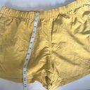 Patagonia  women’s yellow athletic drawstring shorts, size XL # Photo 7