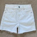 American Eagle  high rise shortie white jean shorts in size 0 Photo 0