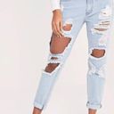 Pretty Little Thing  Kendall Light Wash Super Distressed Mom Jeans Photo 1