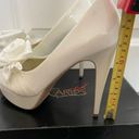 Carlos Santana Heels Photo 2