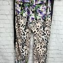 Bebe  Floral Animal print blend joggers with faux leather side pockets. Size M Photo 2