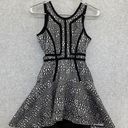 Parker  Sleeveless Cutout sides Asymmetrical hem Black White Dress XS fit flare Photo 0