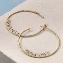 Coach  Signature Logo Hoop Earrings. Photo 1