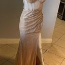 Cinderella Divine Women’s formal sparkly dress size 4
Brand is 
Rose gold color Photo 8