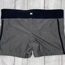 Xersion fitted athletic shorts with no slip hem, black and grey women size Large Photo 4