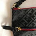 Tommy Hilfiger  Crossbody purse bag in black w/ red accents.  Excellent Condition Photo 3