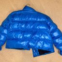 blue puffer jacket Photo 1