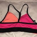 PINK - Victoria's Secret PINK Sport swim suit bikini top orange and pink in color size small spor…​ Photo 4