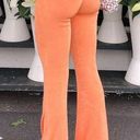 Princess Polly NWT  True Heart Slinky Knit Ruched Flare Pants in Orange Size 6 Photo 2