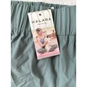 Halara  High Waisted Dolphin Hem Shorts Green Size L NWT Photo 5