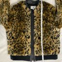 Uniqlo  By Carine Roitfeld faux fur bomber jacket, size large. Photo 6