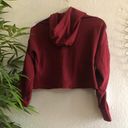 Red burgundy long sleeve crop hoodie sweatshirt with black and white stripes. Size M Photo 1