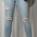 Guess distressed High Rise skinny jeans size 27 Photo 0