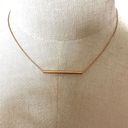 The Bar Gold tone pendant necklace Photo 1