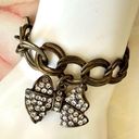 Cookie Lee  brass tone pave rhinestone bow bracelet Photo 1