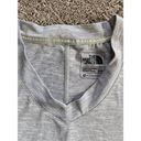 The North Face  woman’s small gray athletic top Photo 2