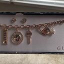 Guess  Rose Gold Charm Bracelet & Earrings Set Photo 1