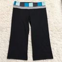 Lululemon  Groove Crop Reversible Yoga Leggings Black Blue 8 Photo 0