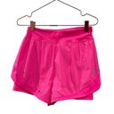 Sweaty Betty  Neon/ sonic pink athletic shorts.  Size small Photo 5