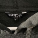 Bebe  hoodie black with gold size L Photo 3