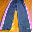 Nike  womens pink & gray track pants large Photo 0