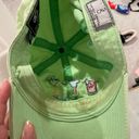 Green baseball cap Photo 2