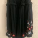 American Eagle romper | size medium | black with red flower embroidered Photo 3