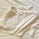 All In Motion Target girls  white tennis skirt built in shorts and zipper pocket Photo 3