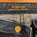 Bebe flare jeans with gold pockets Photo 3