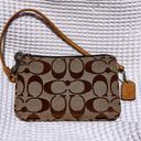 Coach wristlet- signature monogram khaki and tan Photo 1