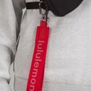 Lululemon Never Lost Keychain in Red/White Photo 1