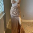 Cinderella Divine Women’s formal sparkly dress size 4
Brand is 
Rose gold color Photo 3