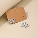 Boutique Coquette Silver Bow Stud Earrings Photo 1