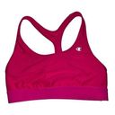 Champion  sports bra size medium a racerback style and a wide band at the back Photo 0