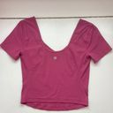 Lululemon This  align t-shirt is in a size 2 and is a dark pink magenta color. Photo 1