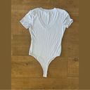 Naked Wardrobe  blue v-neck short sleeve bodysuit Photo 6