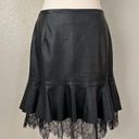 Who What Wear  Black Faux Leather Mini Skirt with Ruffle Lace Hem Photo 0