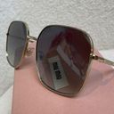 Miu Miu  sunglasses new with case Photo 0