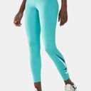 NWT  ONE NIKE DRI FIT WOMEN RUNNING MID RISE 7/8 TIGHTS GREEN Size M Photo 2