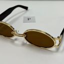 90s Small Oval Brown Sunglasses Photo 1