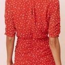 ASTR  The Label Clarice Shirred Bottom Mini Dress in Red Ditsy Small Floral Photo 1