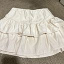 American Eagle white cream denim ruffle mini skirt. size small Photo 1