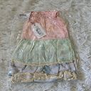 Free The Roses  Color Block Eyelet Trim Detail Mini Skirt in multicolor size XS Photo 1