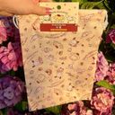Sanrio  Yellow Drawstring Bag With Pochacco Cinnamoroll Pompompurin Photo 1