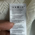 Maje  | Menthe open knit pointelle ruffle top in ecru Photo 7