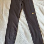Nike Leggings with Gold Swoosh Photo 0