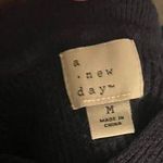 A New Day Sweater Photo 1