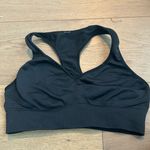 Lululemon black  sports bra in good condition except for the logo fading Photo 0