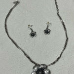 Elegant Silver Floral Necklace and Earring Set Photo 0