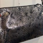 BLACK SILVER METALLIC FAUX SNAKESKIN DESIGN CLUTCH
SOFT PLEATHER LIKE MATERIAL Photo 4